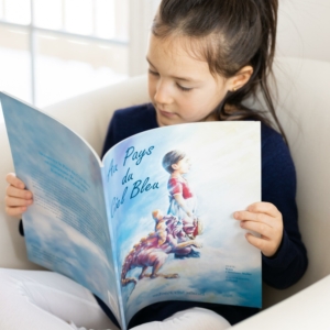 livre Au Pays du Ciel Bleu - lu par une jeune fille